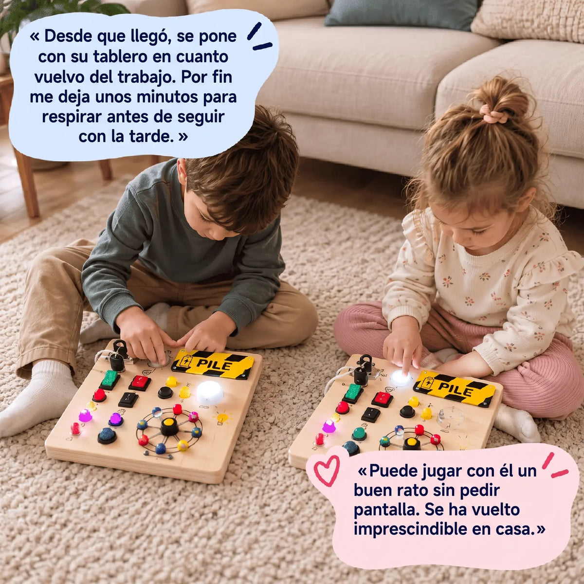 Dos niños jugando con el tablero luminoso
